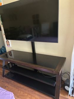 Tv stand and 55” tv