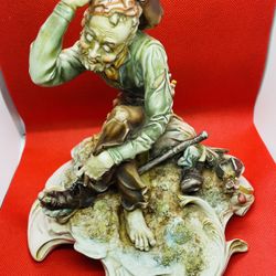Vintage Porcelain Sculpture “Foot Loose” 