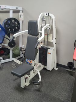 Dual shoulder press and shrug hoist commercial weight machine