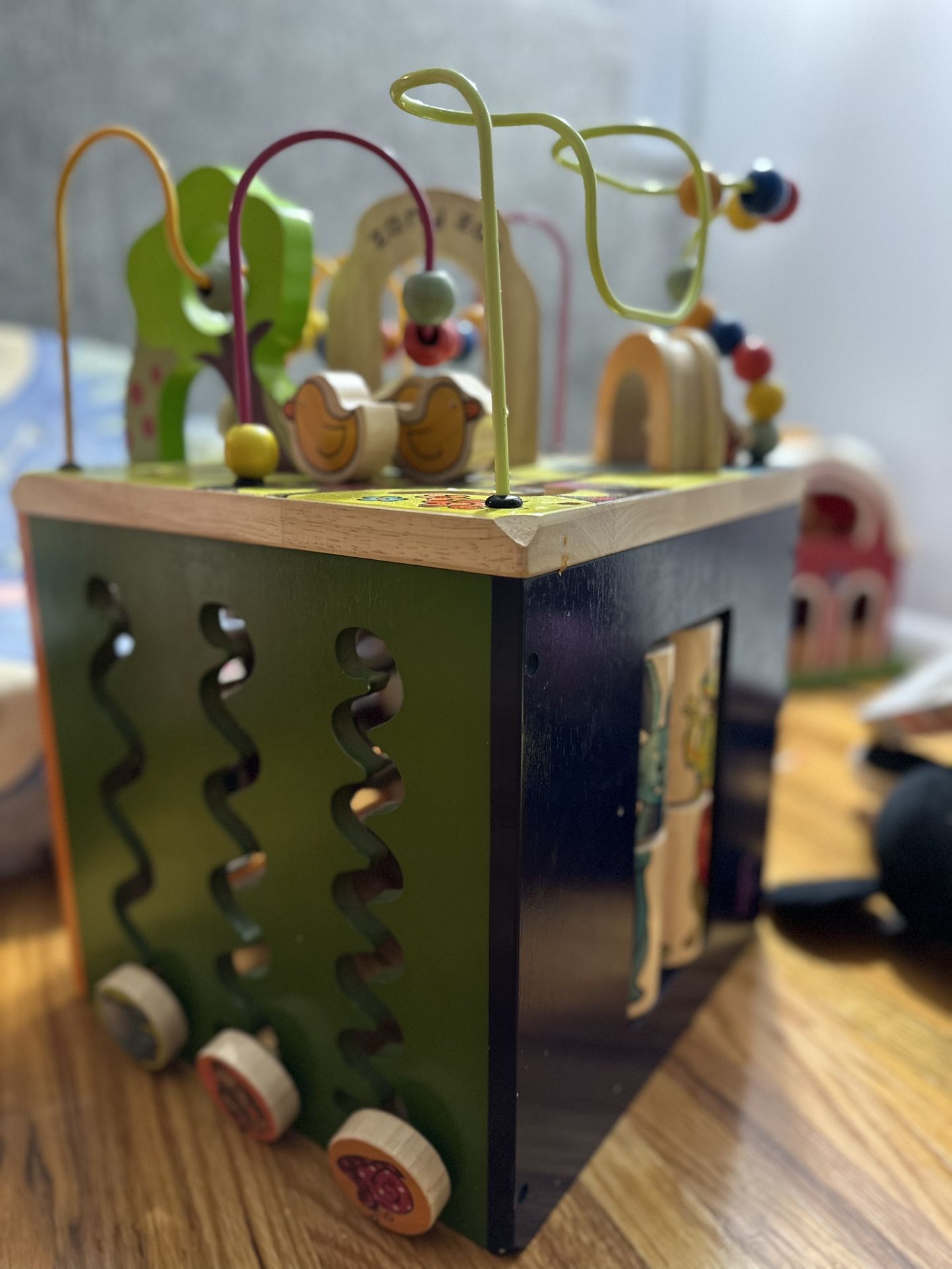 B. Toys Wooden Activity Cube - Zany Zoo