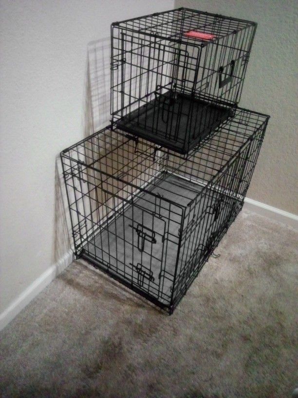 Gently Used Large And Small Dog Kennel