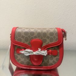 Women saddle-style brown with Red crossbody bag
