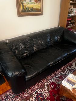 Black synthetic leather couch