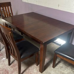 Table And 4 Leather Chairs Beautiful. Made By Ashley 