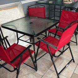 New porch table with four red chair