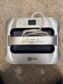 Handheld heat press