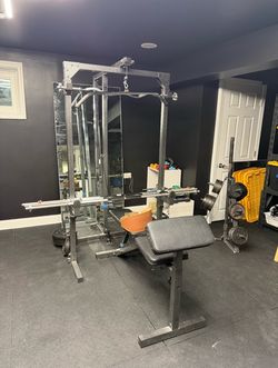 Gym machine , bench, free weights