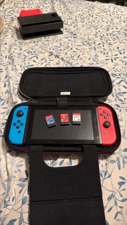 Nintendo switch bundle + 3 games