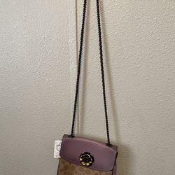 New small coach purse can fit keys phone cards and cash $125