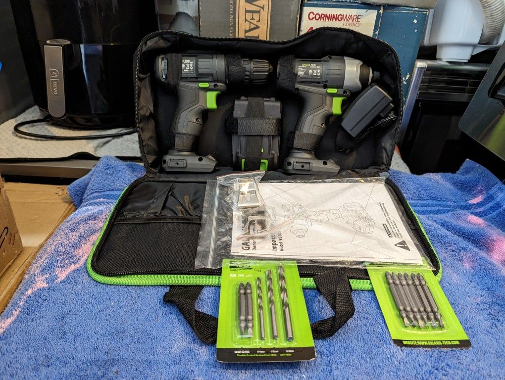 Brand New Two Drill Impact Drill Set With Battery Charger Bag And Drill Bit Kit With Lifetime Warranty