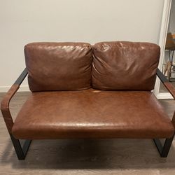 Faux leather love seat