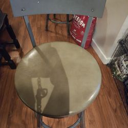 Four Spinning Metal Bar Stools $150