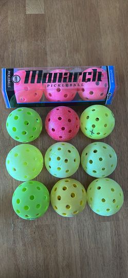 Pickleballs Assorted Pickleballs (12). Some are brand new. Pink, green, yellow