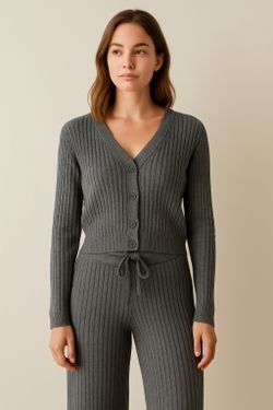 Wrap yourself in cozy elegance with our Charcoal Grey Ribbed Knit Set! Featuring a soft button-front cardigan and matching wide-leg pants