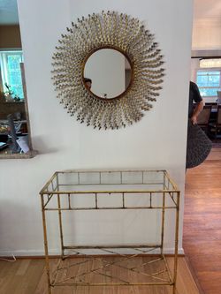 Gold Consul table with mirror