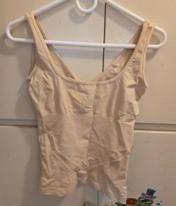 Women's shapewear garment designed to slim the waist