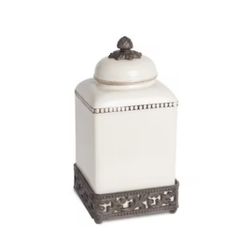 Cream Stoneware 13.5” Canister With Metal Acanthus Leaf Base.