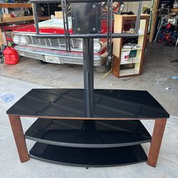 TV stand with TV mount built in