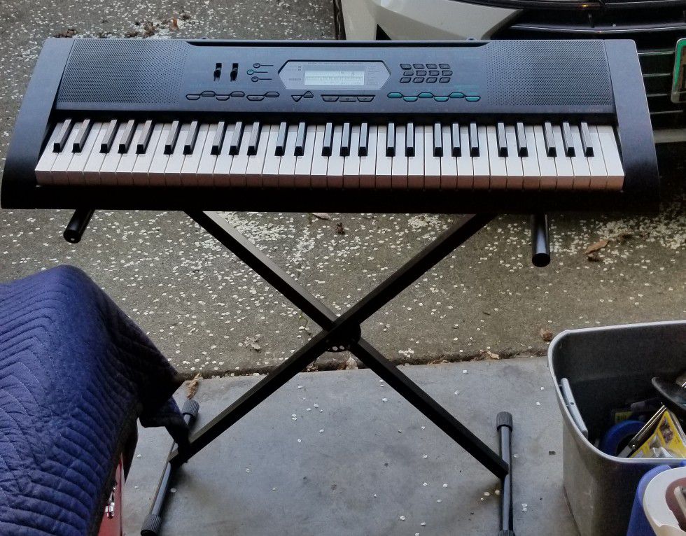 Casio keyboard with stand. ( see description)