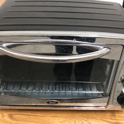 Oster toaster oven almost new