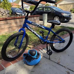 Boy’s Bicycle with pads and helmet