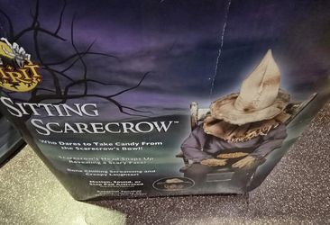 Spirit Halloween 2016 Model Sitting Scarecrow