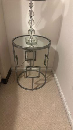 3 silver metal and mirror tables