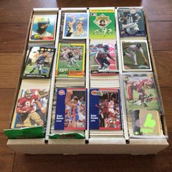 2400 baseball, basketball and football cards. $50