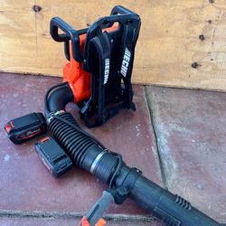 Used  echo 66 v backpack blower with 2 batteries 5.0 and dual charger