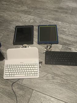 Two Ipad 2’s with chargers and keyboards