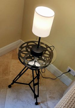 Two side metal tables that are unique