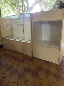 2 Glass Showcases 48”Lx17.5”Wx38”H- 24”Lx17.5”Wx38”H