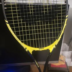 Wilson Energy XL tennis racket.