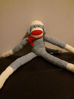 Stuffed ugly sock monkey