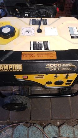 A.S.IS 4000 WATTS CHAMPION GENERATOR JUST NEEDS A NEW MUFLER BUT IT RUNS AN MAKES POWER