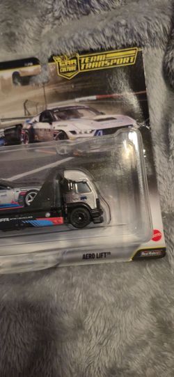 HotWheels Premium Ford Mustang RTR Spec 5 with matching Aero Lift hauler