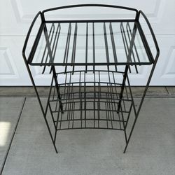 metal wine rack with glass top and integrated glass holder