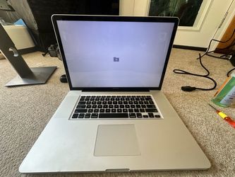 Apple Mac Book A1297-RAM 8GB-17in Screen-HDD Missing-Powers on- Charger Included
