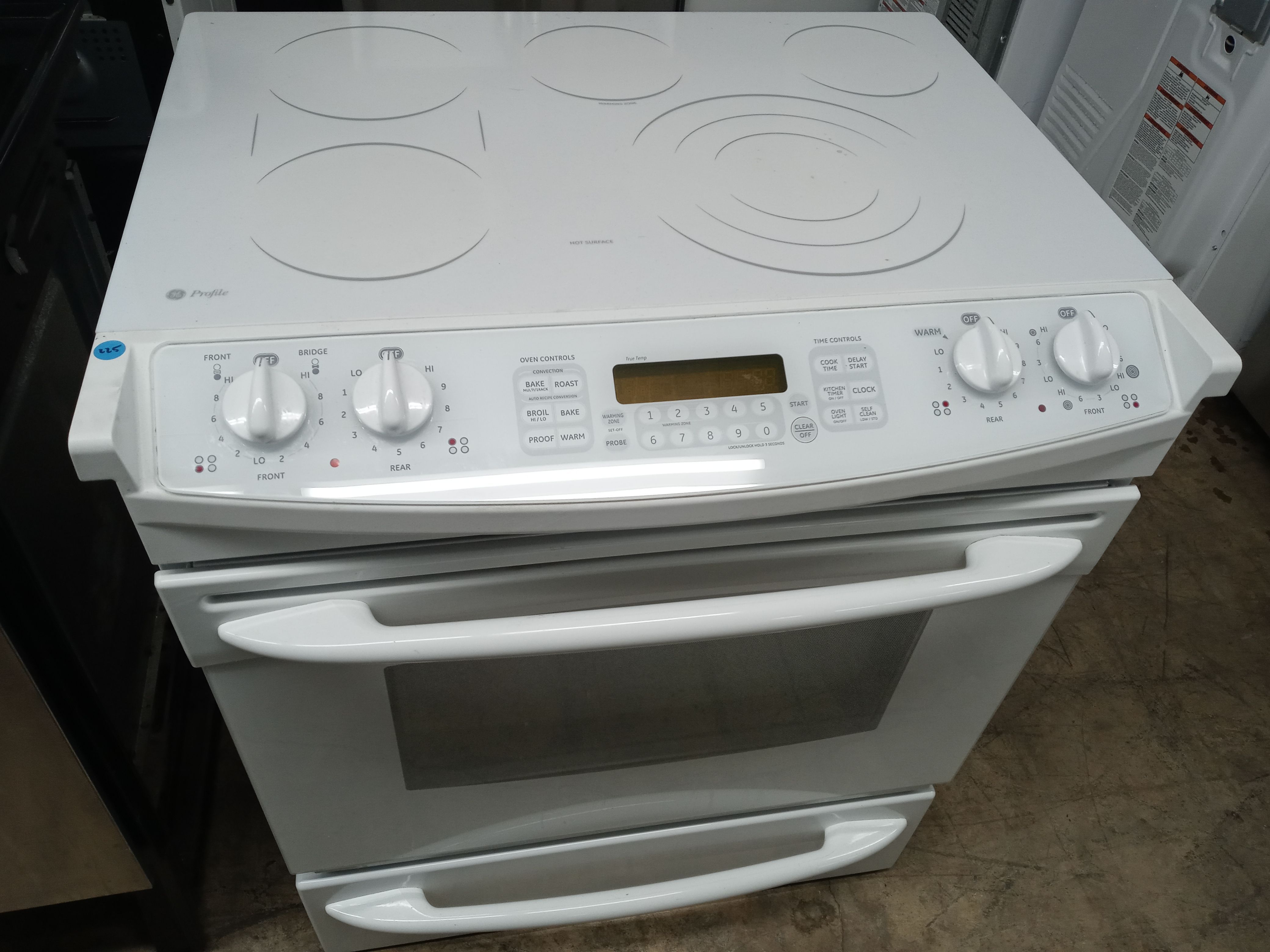 GE Profile white glasstop slide-in range - Free delivery