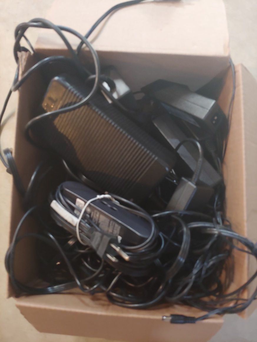 Free. Big box of laptop power supplies / adapters