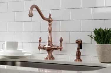 Kingston Heirloom KS177ALBSAC - Heritage Two-Handle 2-Hole Kitchen Faucet with Brass Sprayer, Antique Copper