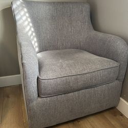 Grey Swivel glide chair
