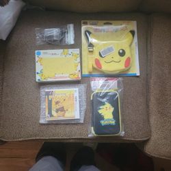 Nintendo 3DS XL Pikachu Yellow Edition Pack W/ Detective Pikachu Game, Charger, Pikachu Hard Pouch, And Japanese Import Mori Plush Pikachu Head Bag