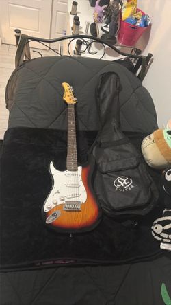 Left handed electric guitar with case