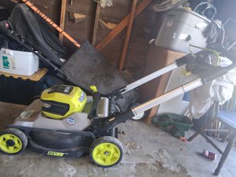 Ryobi lawn mower. 2 40v batteries/ charger