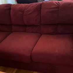 Red Triple seater couch