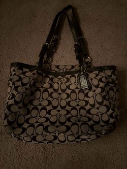 Coach tan/black tote bag with relating c logo