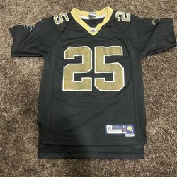 This is a black Reebok NFL New Orleans Saints Reggie Bush #25 football jersey