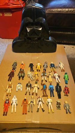 Vintage Star Wars figures and a 1980 Darth Vader case