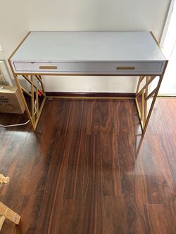 White and gold wood desk